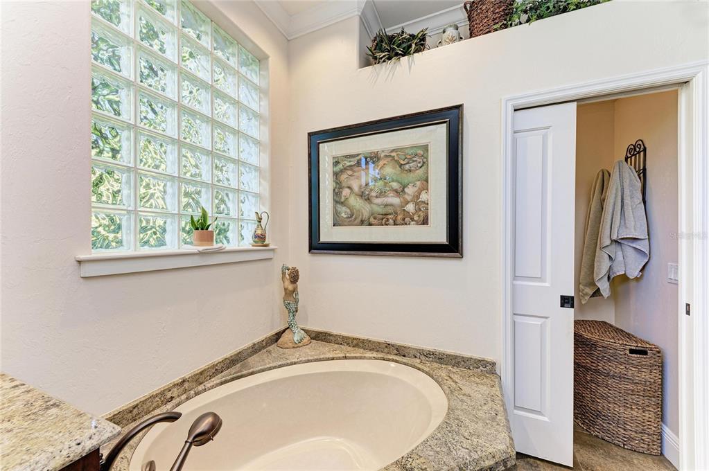 39321 Washington Loop Road Punta Gorda, FL 33982 - Photo 42 of 98 a view of a bathroom with a tub and a window