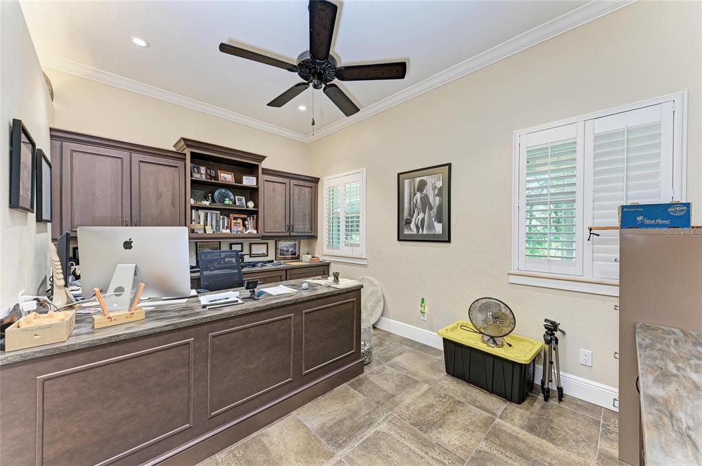 39321 Washington Loop Road Punta Gorda, FL 33982 - Photo 44 of 98 a kitchen with a refrigerator and a sink