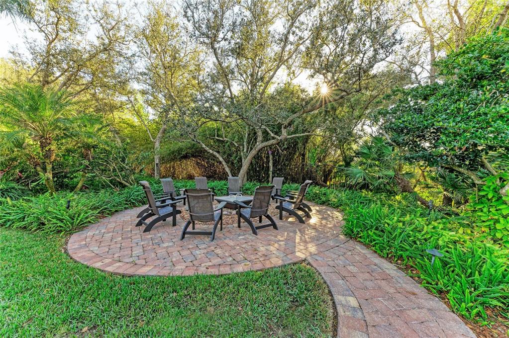 39321 Washington Loop Road Punta Gorda, FL 33982 - Photo 80 of 98 a view of a backyard with table and chairs