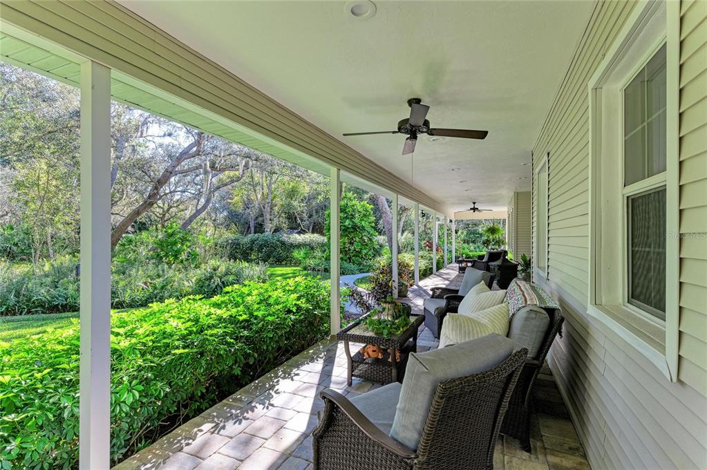 39321 Washington Loop Road Punta Gorda, FL 33982 - Photo 84 of 98 a view of a porch with furniture and a yard