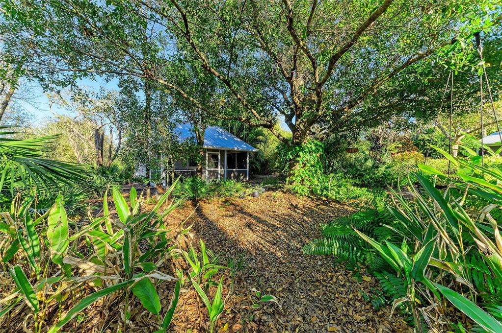 39321 Washington Loop Road Punta Gorda, FL 33982 - Photo 89 of 98 a view of a house with a yard