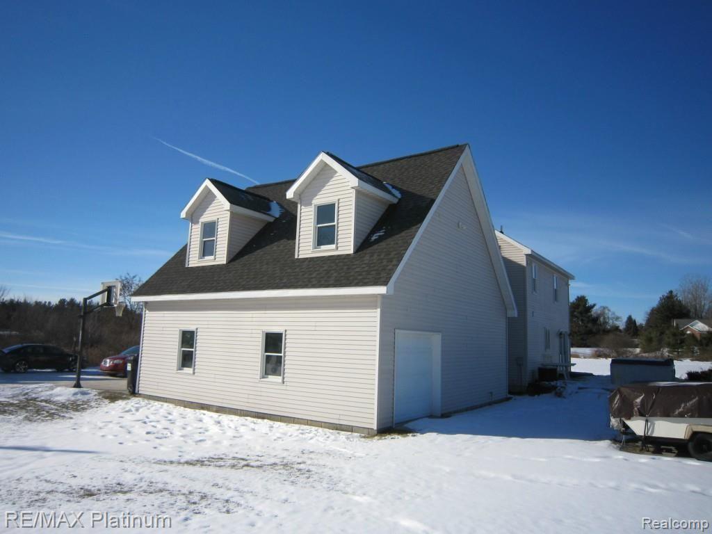 6223 Golf Club Road Howell, MI 48843 - Photo 15 of 16 golf club side view.jpg