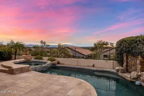 a view of outdoor space and swimming pool