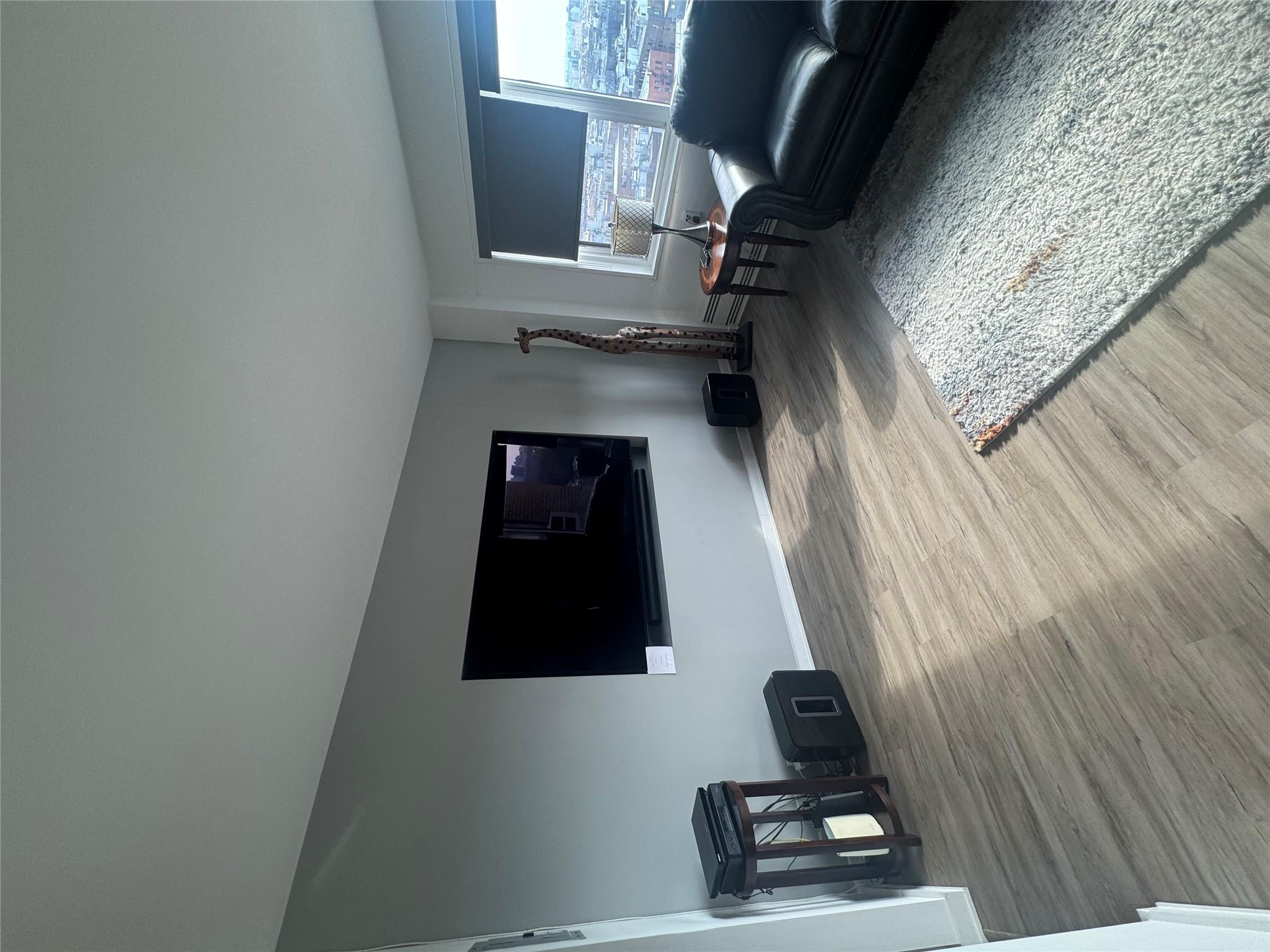 9 Fordham Hill Ovl, Unit 17C Bronx, NY 10468 - Photo 12 of 16 Living room with hardwood / wood-style floors
