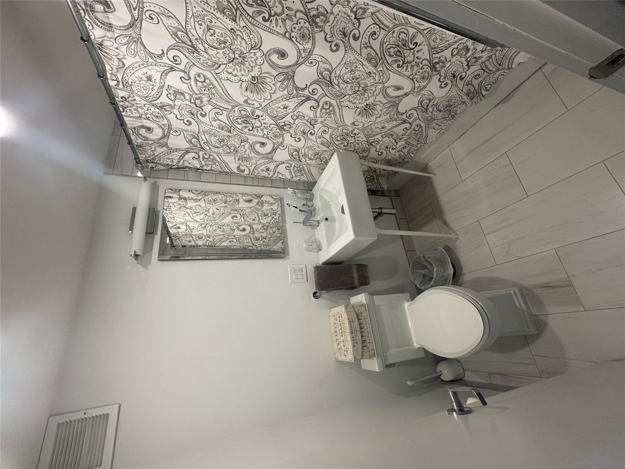 9 Fordham Hill Ovl, Unit 17C Bronx, NY 10468 - Photo 3 of 16 Bathroom with toilet and sink