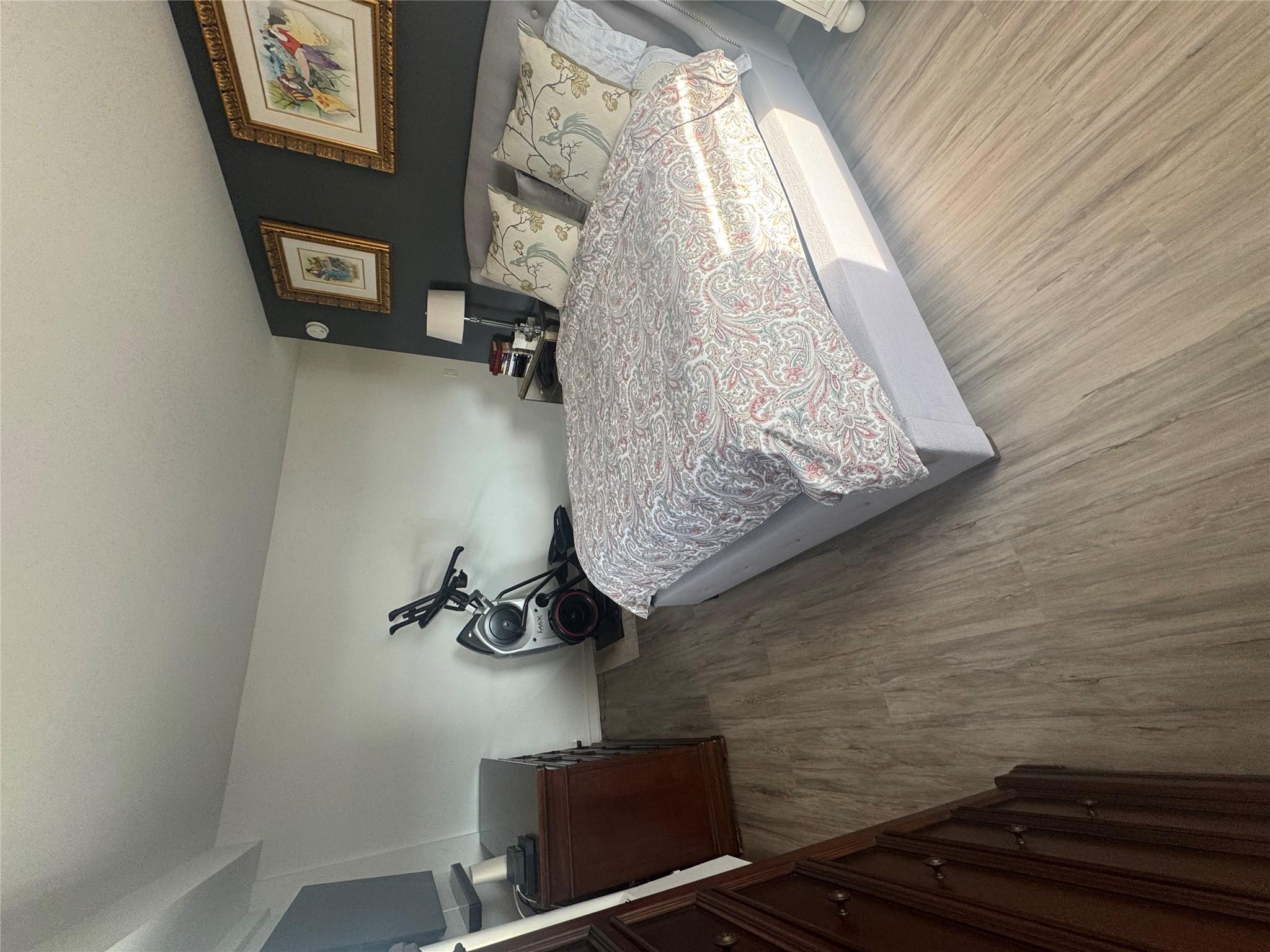 9 Fordham Hill Ovl, Unit 17C Bronx, NY 10468 - Photo 5 of 16 Bedroom with hardwood / wood-style floors