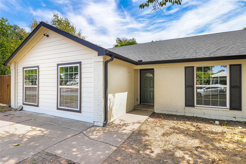 629 Edna Court Everman, TX 76140 - Photo 2 of 24 a view of a backyard of a house