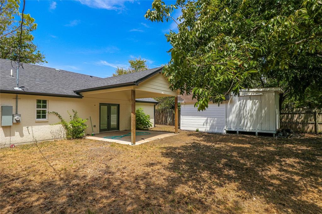 629 Edna Court Everman, TX 76140 - Photo 23 of 24 a front view of a house with a yard