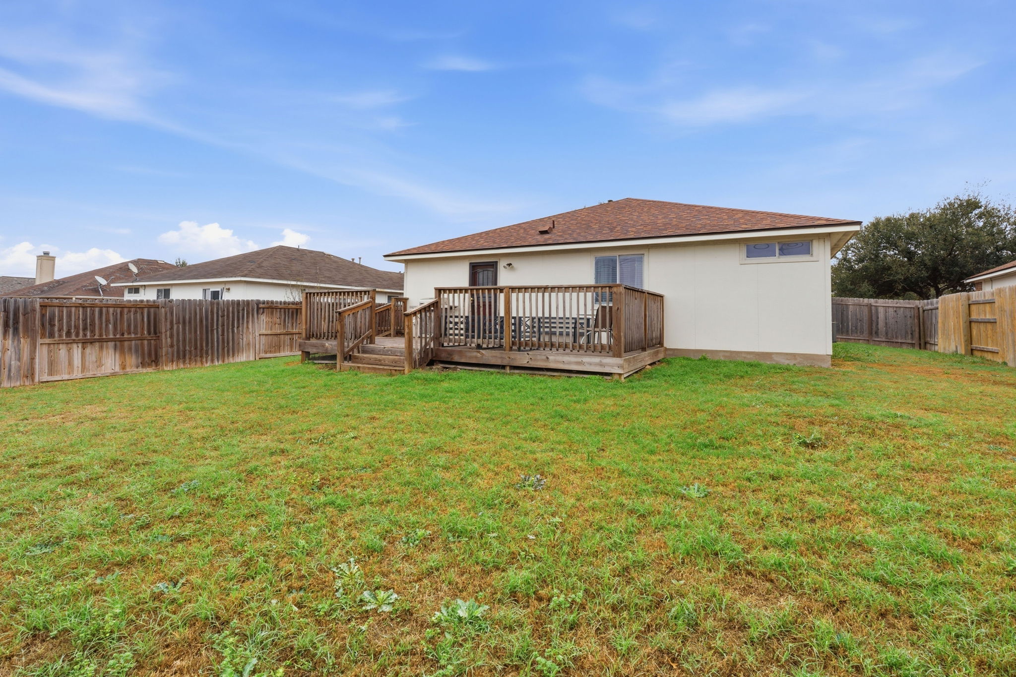 626 Atlantis Kyle, TX 78640 - Photo 23 of 23 a view of a house with a yard and sitting area
