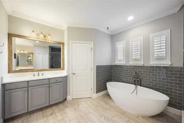 a view of a porch with wooden floor and outdoor space