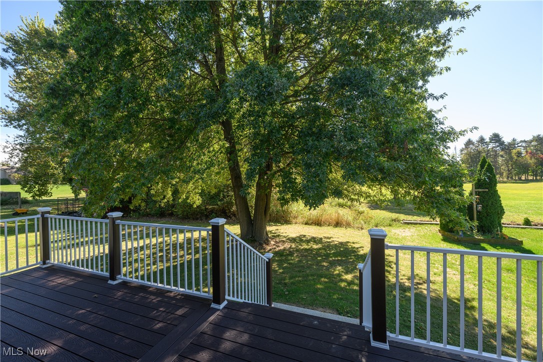 3012 Shellhart Road Barberton, OH 44203 - Photo 9 of 28 Wooden terrace with a lawn