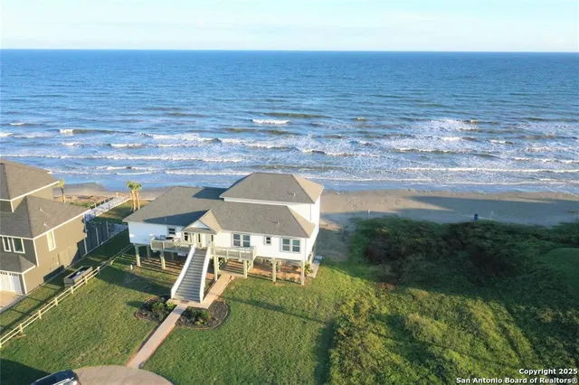 a view of a ocean with a yard