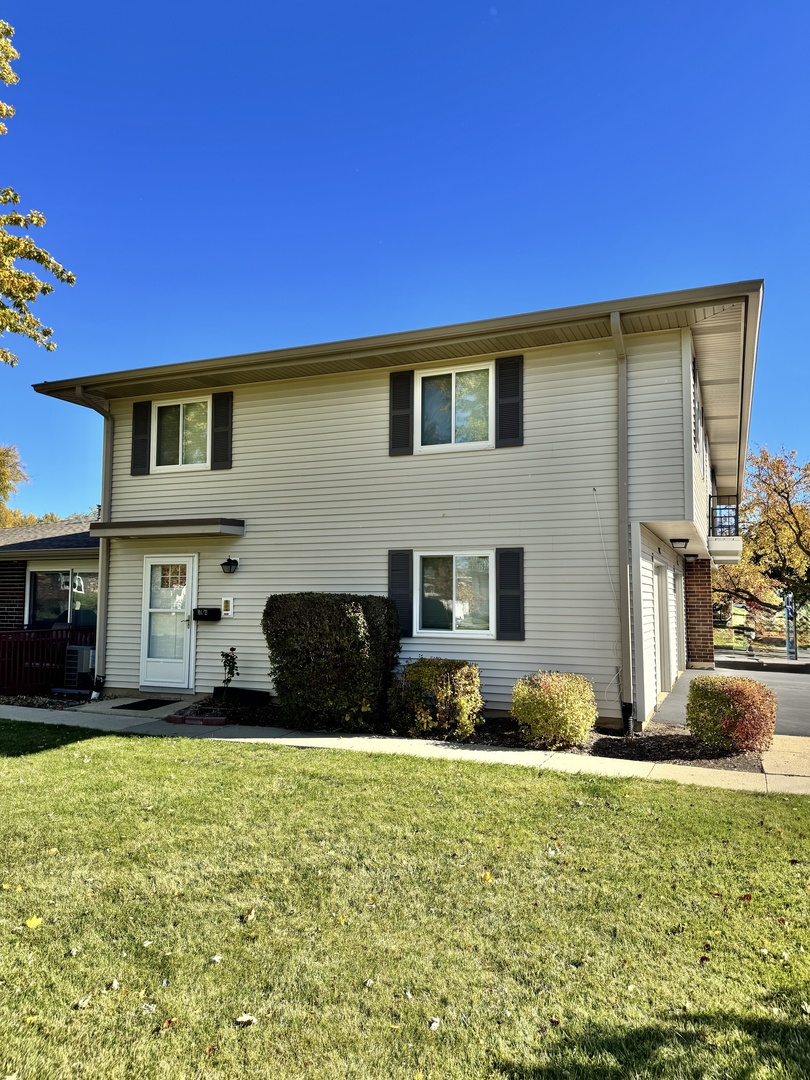a house view with a garden space
