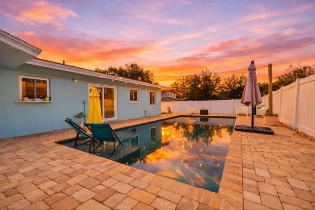 a view of a terrace with chairs