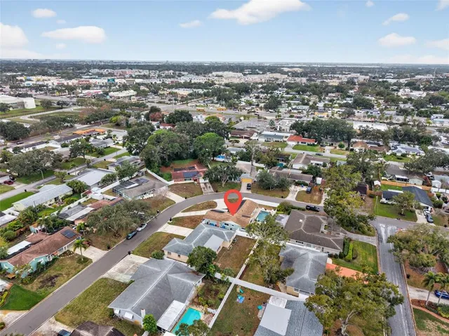 an aerial view of a city with lots of residential buildings