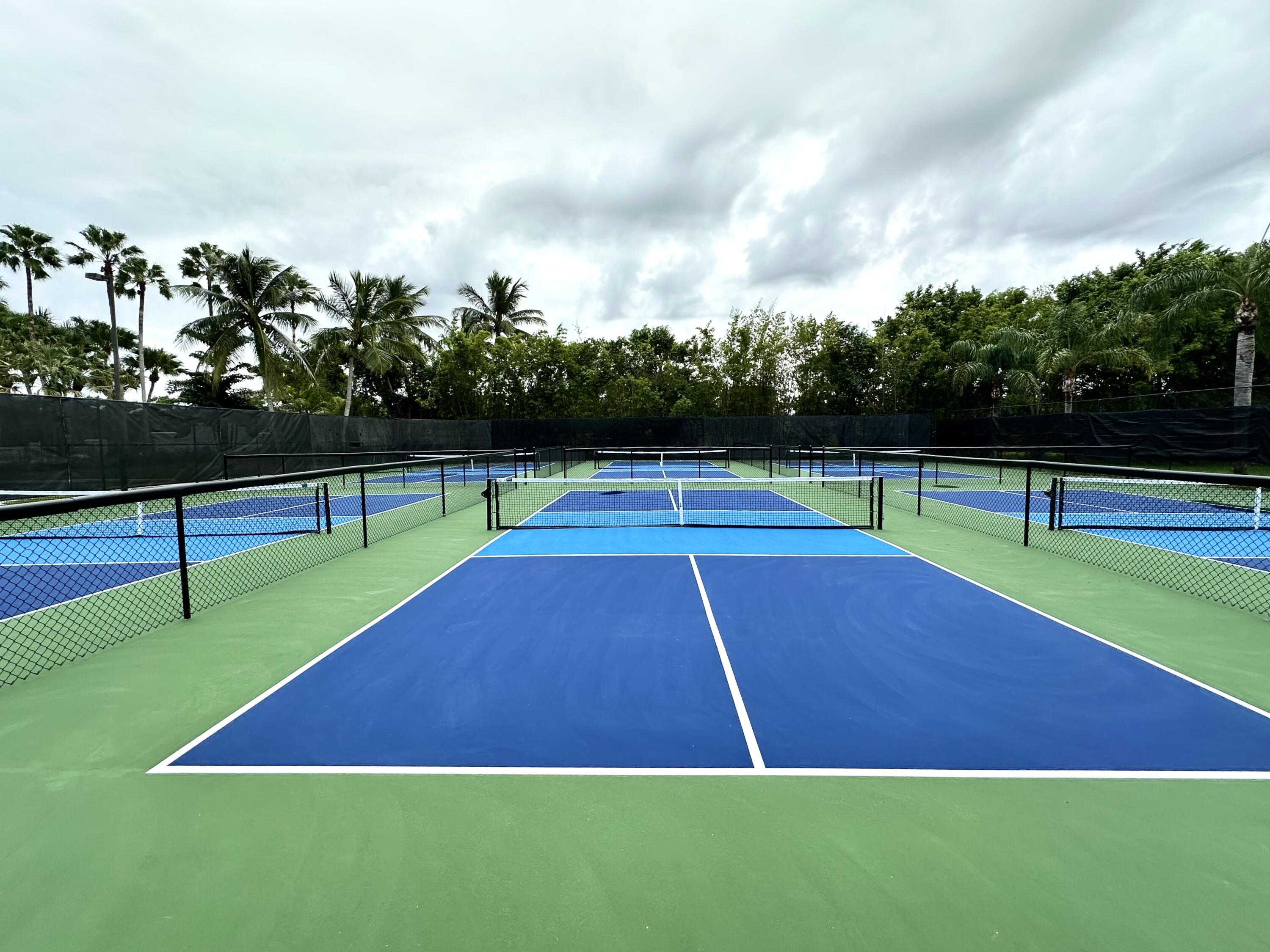 7096 Cataluna Circle Delray Beach, FL 33446 - Photo 29 of 32 a view of an outdoor space and basketball court