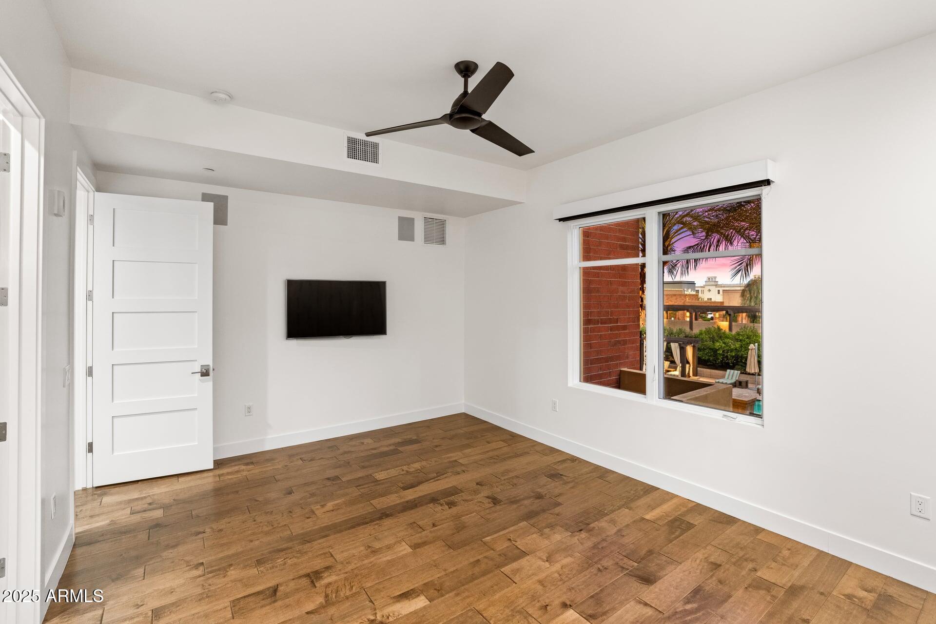 6166 North Scottsdale Road, Unit B2008 Paradise Valley, AZ 85253 - Photo 30 of 69 a view of an empty room with a window