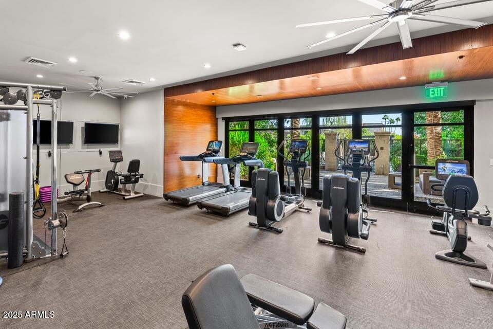 6166 North Scottsdale Road, Unit B2008 Paradise Valley, AZ 85253 - Photo 52 of 69 a view of a room with gym equipment and a large window