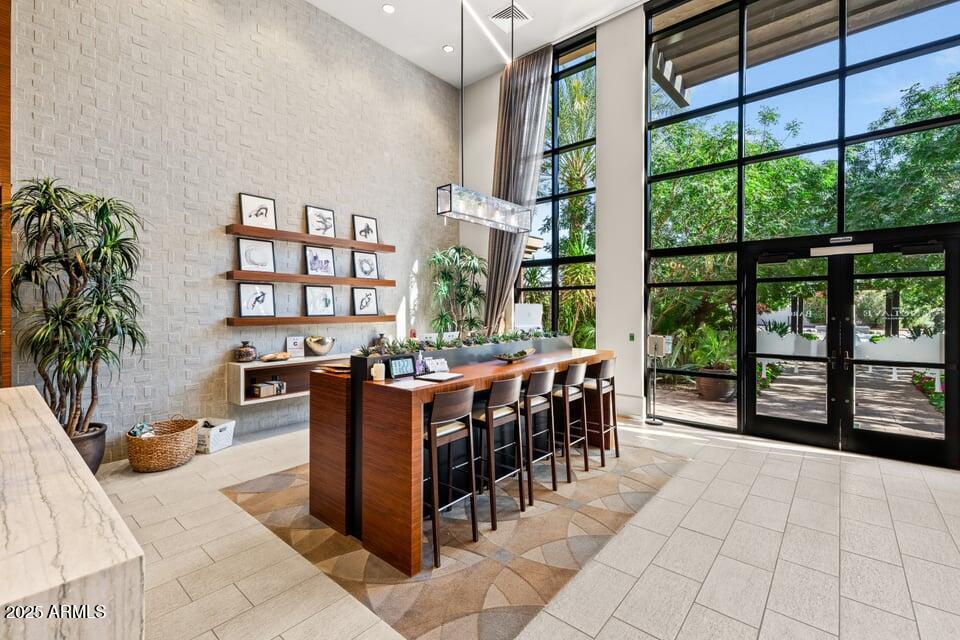 6166 North Scottsdale Road, Unit B2008 Paradise Valley, AZ 85253 - Photo 55 of 69 a view of a dining room with furniture window and outside view