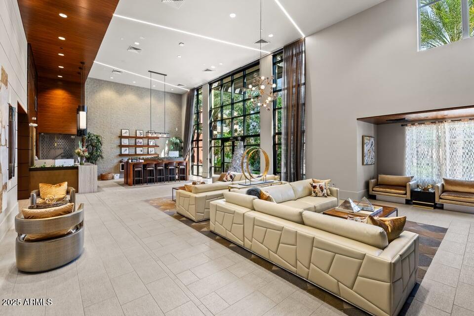 6166 North Scottsdale Road, Unit B2008 Paradise Valley, AZ 85253 - Photo 56 of 69 a living room with furniture and a large window