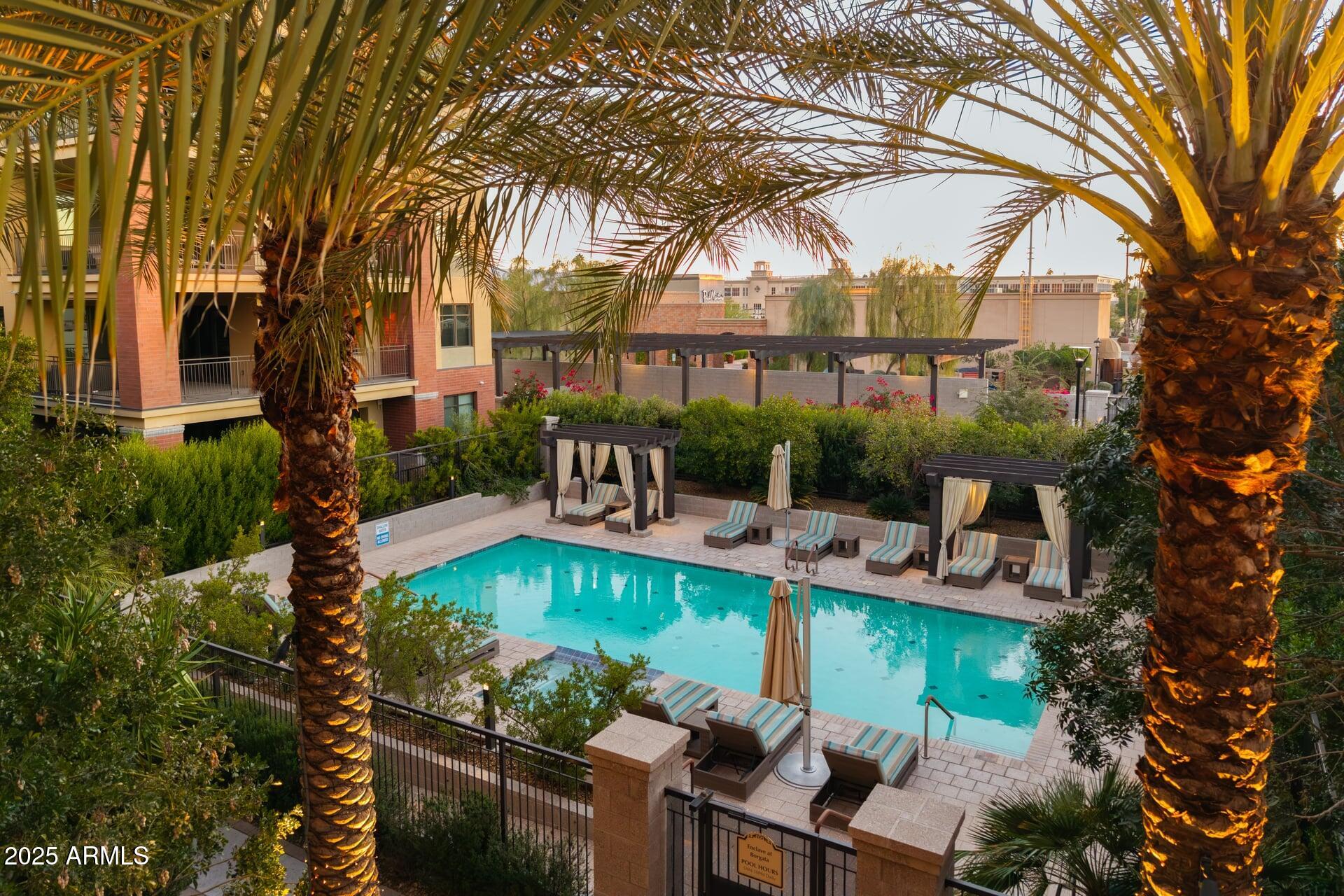 6166 North Scottsdale Road, Unit B2008 Paradise Valley, AZ 85253 - Photo 68 of 69 a view of a swimming pool with a patio