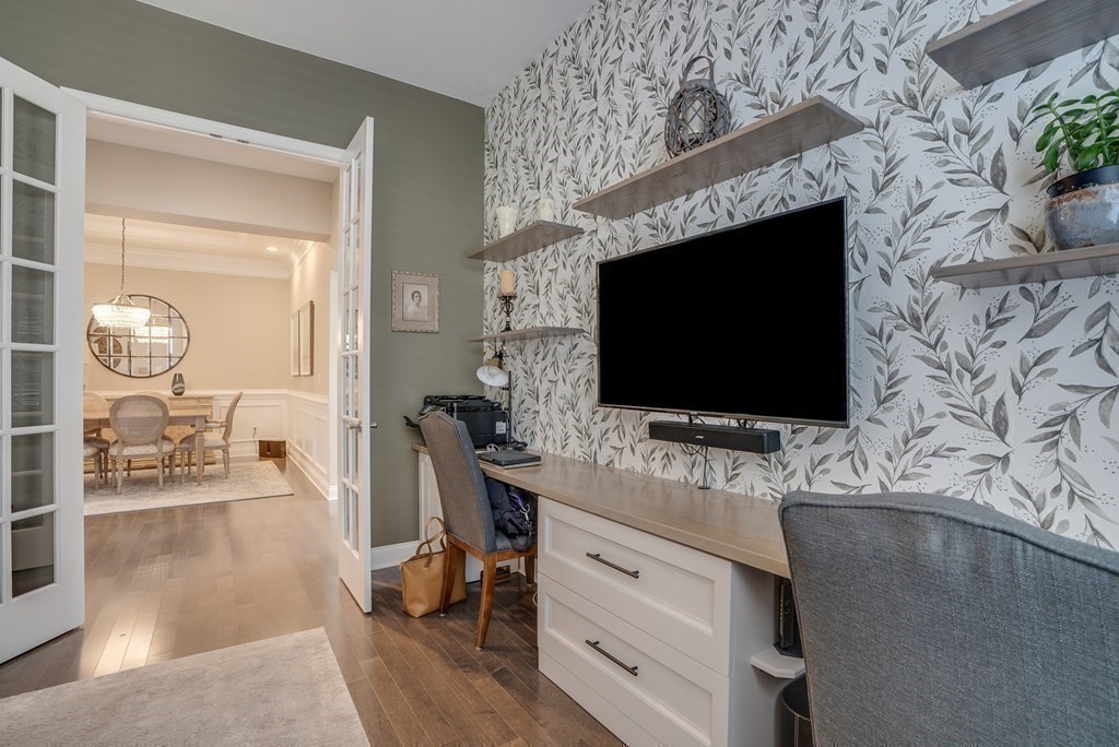 20 Sequoia Drive, Unit 20 Methuen, MA 01844 - Photo 20 of 42 a living room with furniture and a flat screen tv