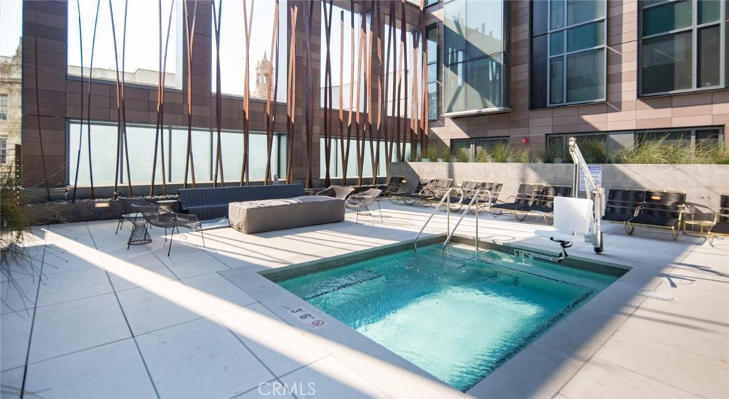 150 Van Ness Avenue, Unit 1036 San Francisco, CA 94102 - Photo 14 of 75 a view of swimming pool with outdoor seating