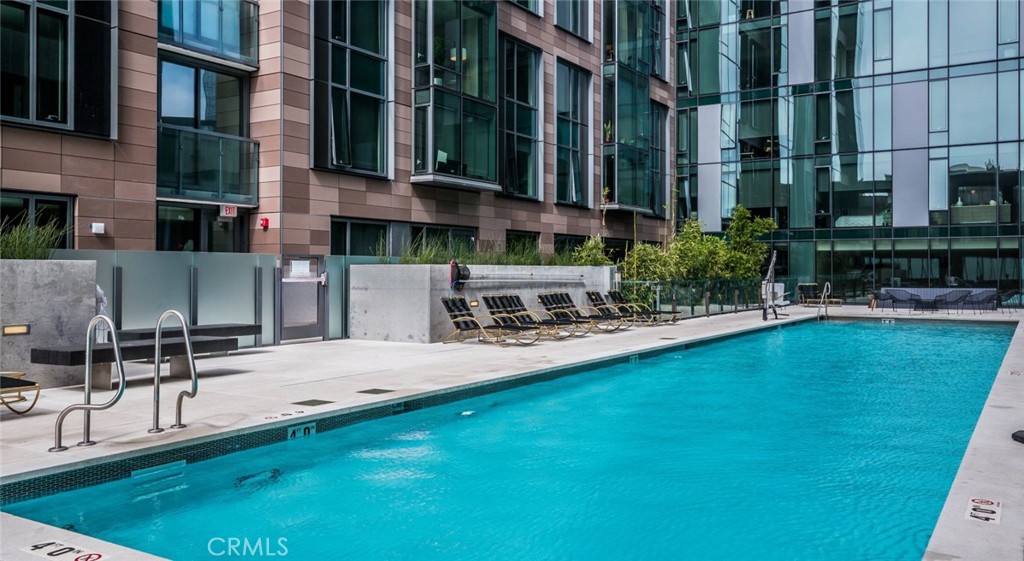 150 Van Ness Avenue, Unit 1036 San Francisco, CA 94102 - Photo 34 of 75 a swimming pool with outdoor seating and yard