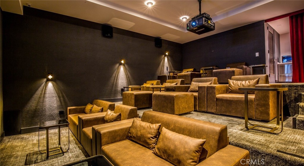 150 Van Ness Avenue, Unit 1036 San Francisco, CA 94102 - Photo 39 of 75 a media room with lots of chairs and mirrors