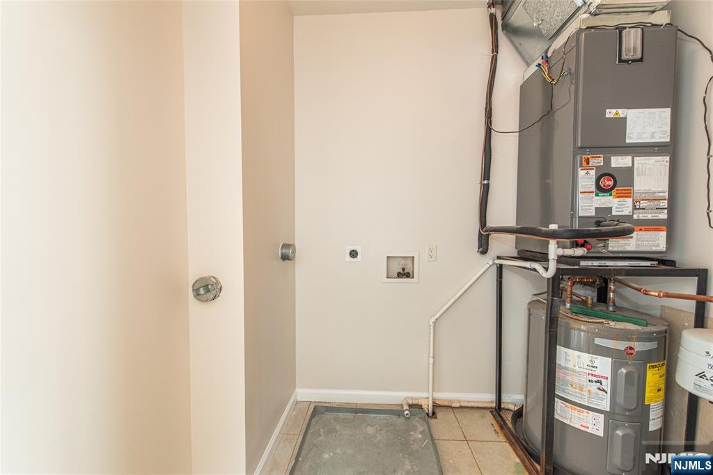 280 Main Street, Unit 305 Little Falls, NJ 07424 - Photo 16 of 24 a view of livingroom with furniture and window