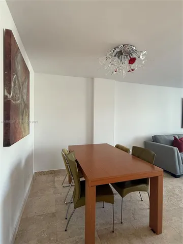 a front view of multi story residential apartment building with a yard