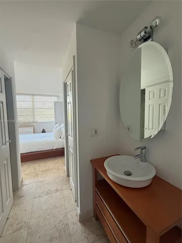 a bathroom with a shower and a toilet