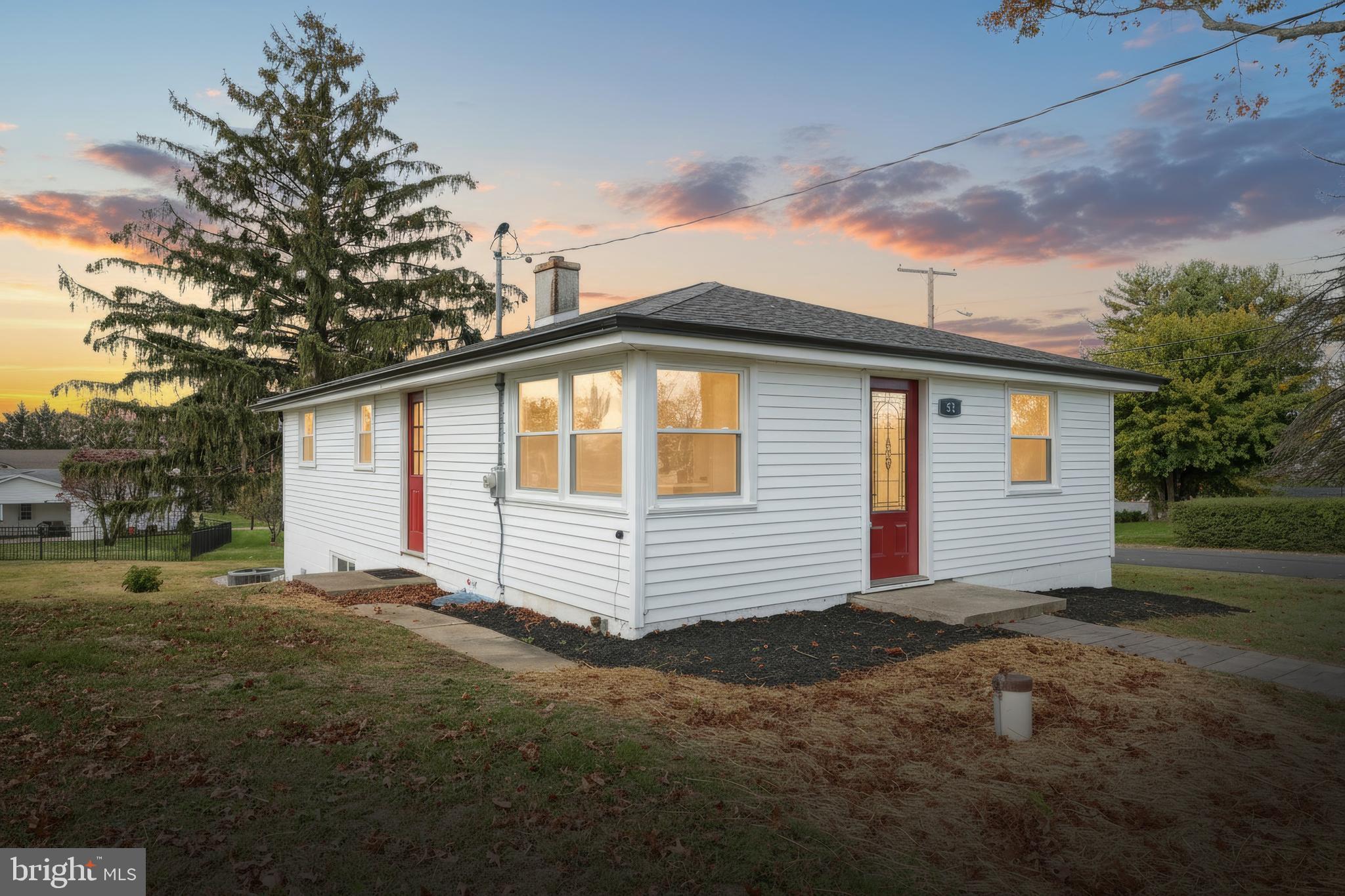 a front view of house with yard
