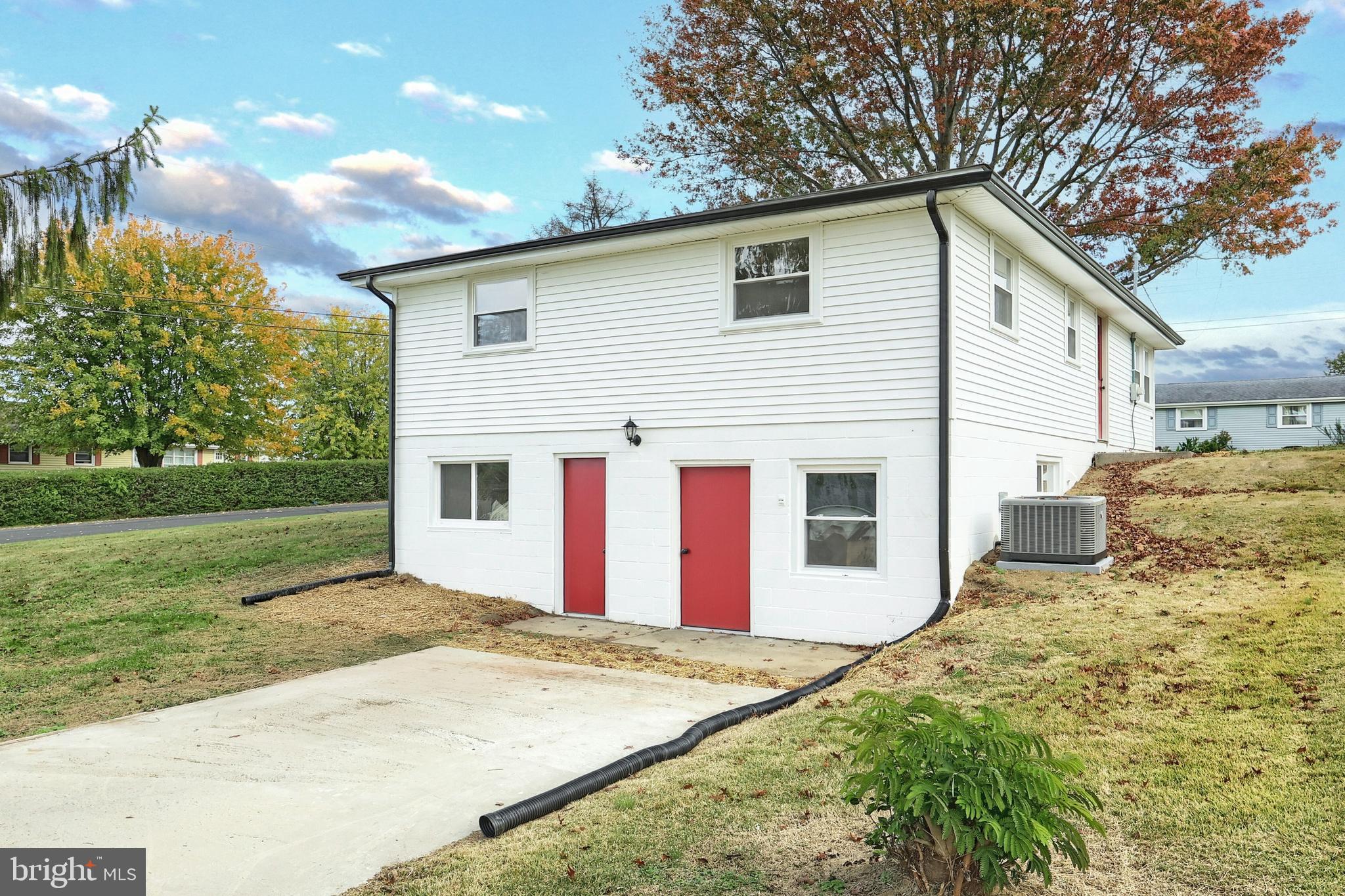 52 Oak Drive Hanover, PA 17331 - Photo 12 of 41 a view of a house with a yard and garage
