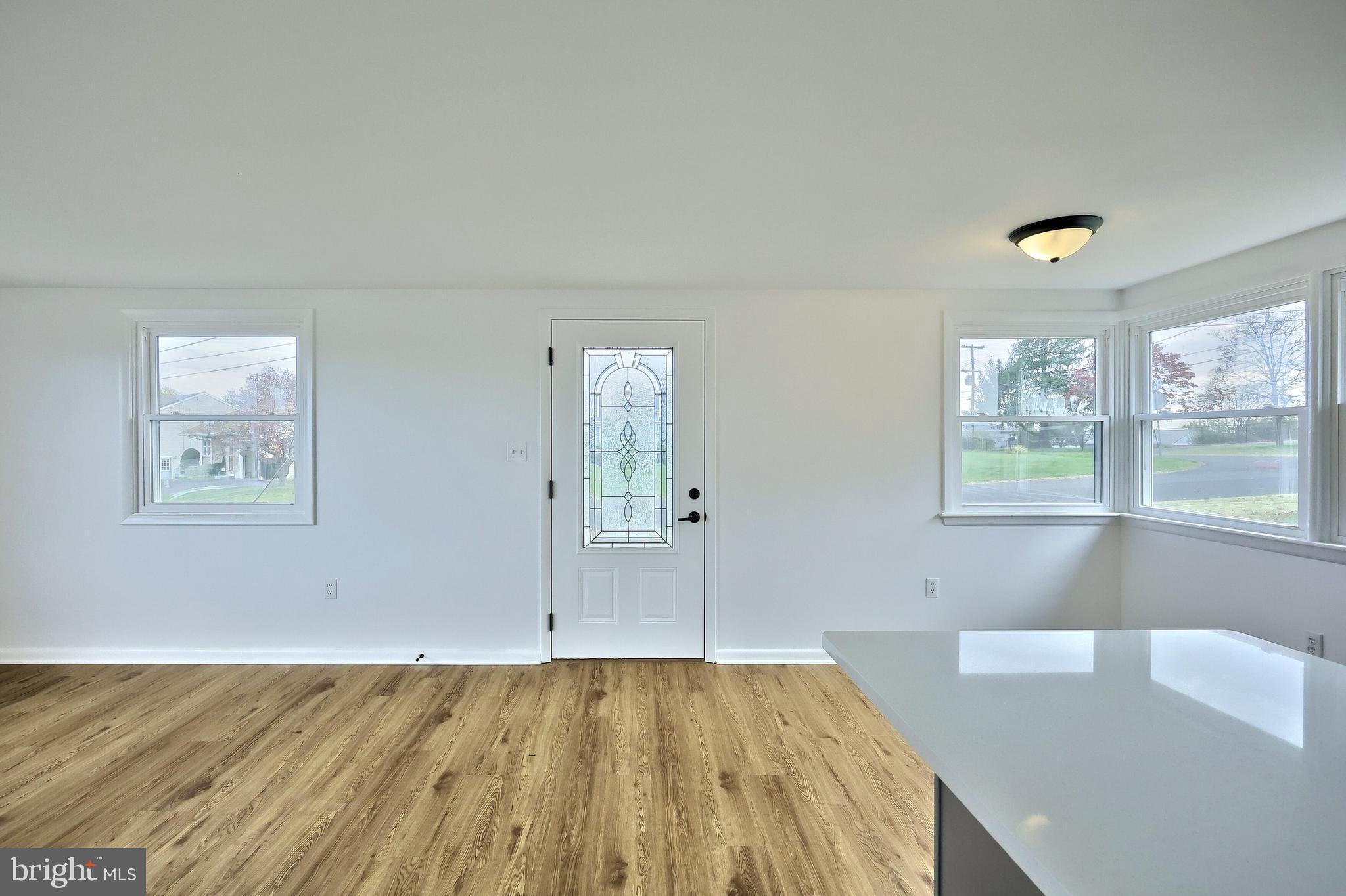 52 Oak Drive Hanover, PA 17331 - Photo 17 of 41 a view of a bedroom with wooden floor and windows