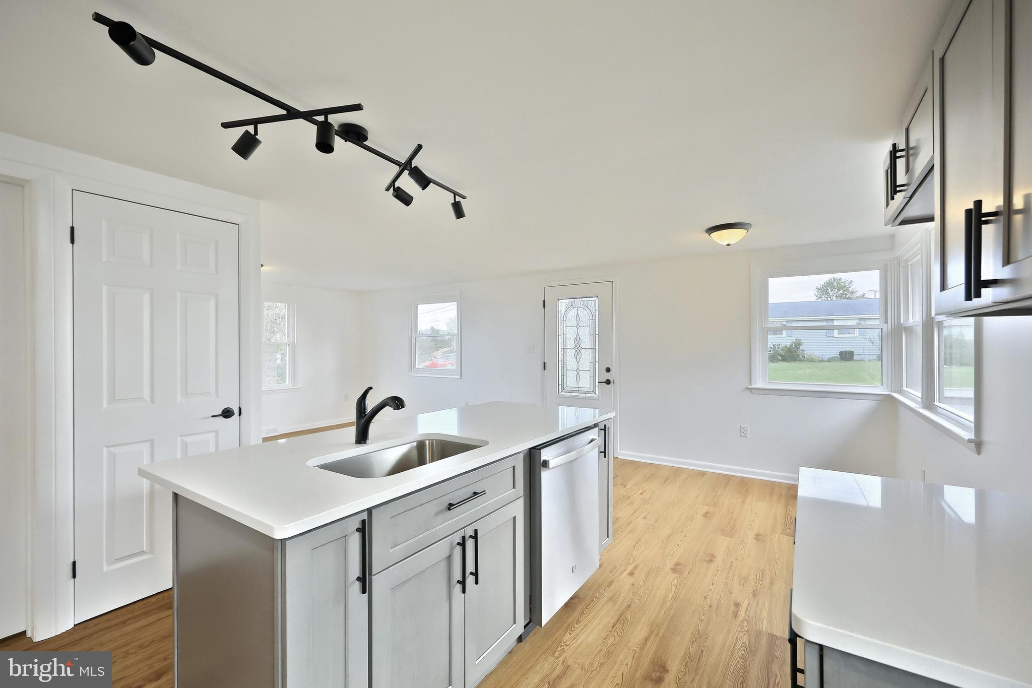 52 Oak Drive Hanover, PA 17331 - Photo 19 of 41 a kitchen with a sink and wooden floor