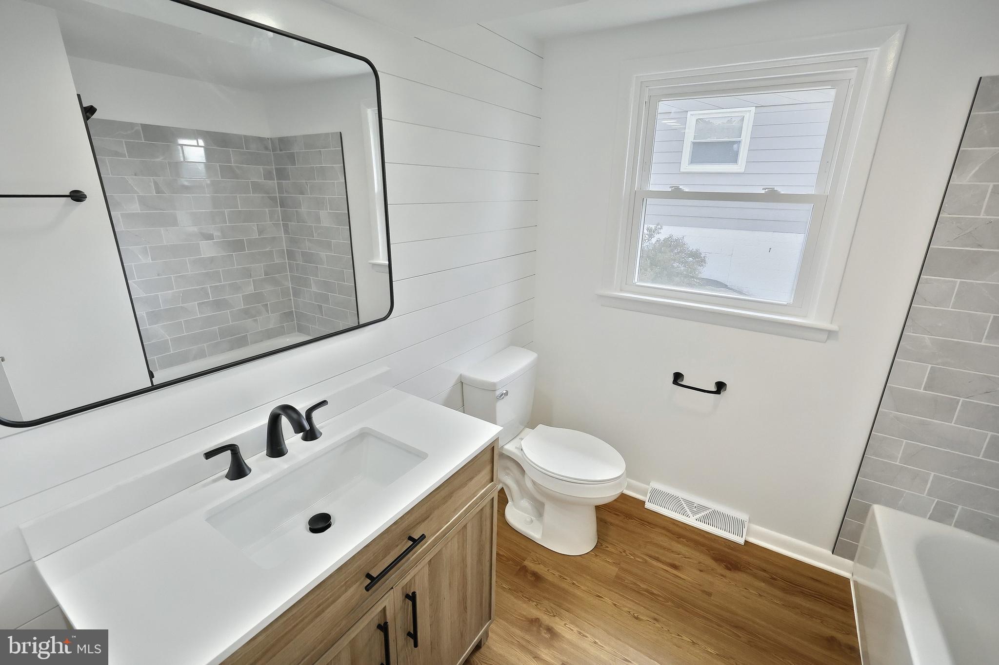 52 Oak Drive Hanover, PA 17331 - Photo 21 of 41 a bathroom with a sink and a mirror