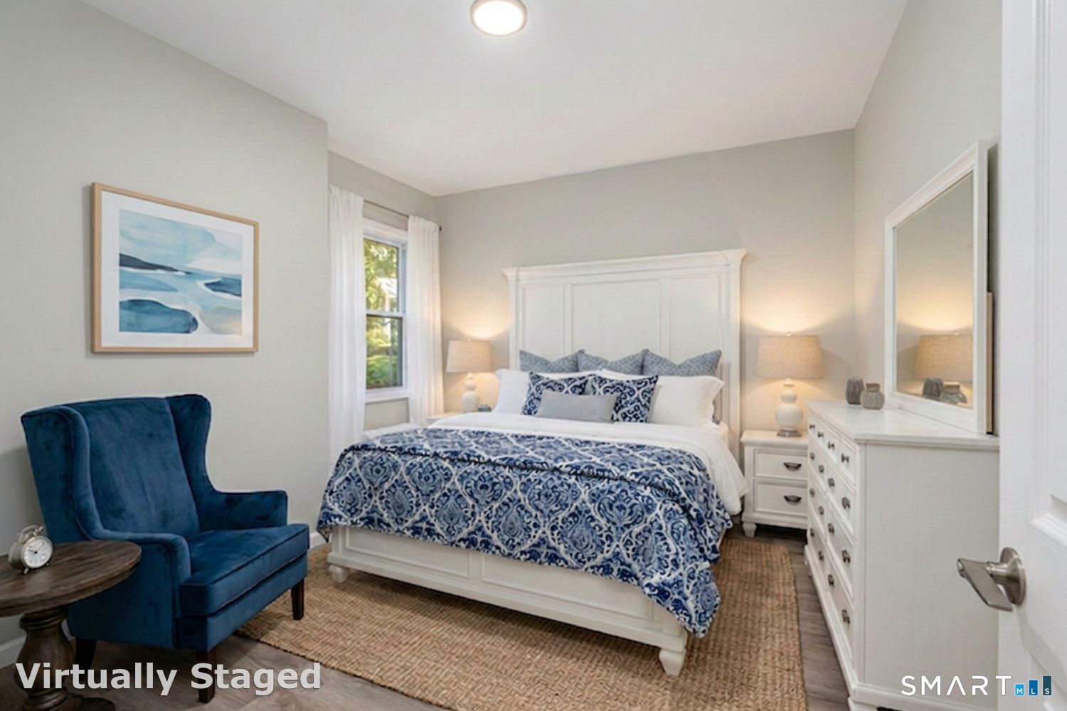 1040 Connecticut Avenue Bridgeport, CT 06607 - Photo 11 of 26 a bedroom with a bed and a couch