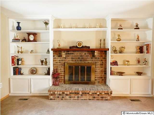112 Jordan Road Brick, NJ 08724 - Photo 15 of 25 a living room with a fireplace