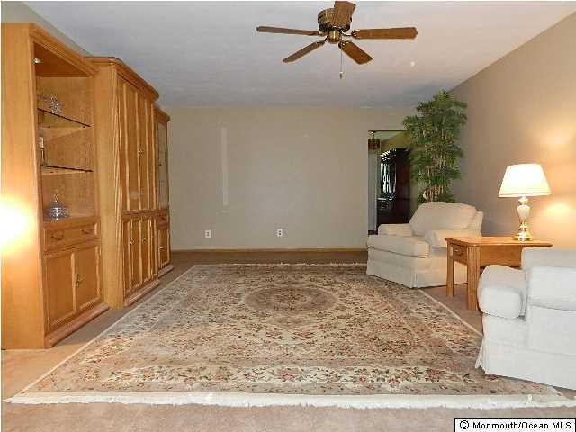 112 Jordan Road Brick, NJ 08724 - Photo 16 of 25 a living room with furniture and a rug