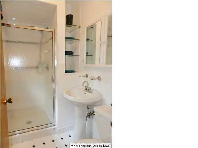 112 Jordan Road Brick, NJ 08724 - Photo 21 of 25 a bathroom with a sink shower and a mirror