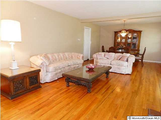 112 Jordan Road Brick, NJ 08724 - Photo 6 of 25 a living room with furniture and a wooden floor