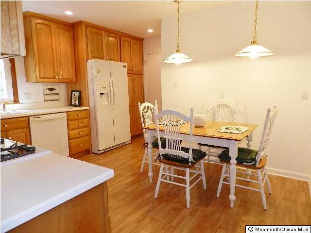 112 Jordan Road Brick, NJ 08724 - Photo 10 of 25 a view of a dining room with furniture and wooden floor