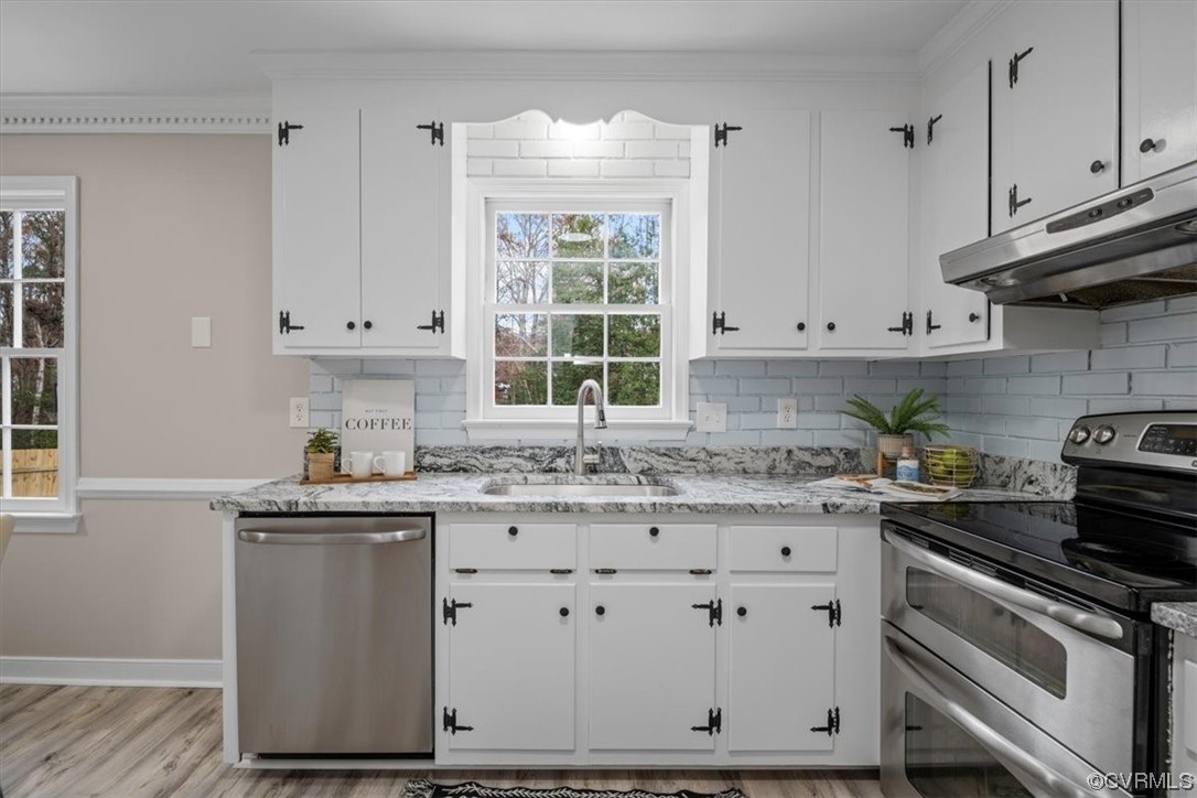 4606 Brookridge Road Chesterfield, VA 23832 - Photo 17 of 48 a kitchen with granite countertop white cabinets and white appliances