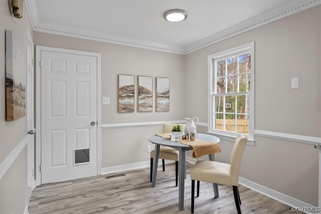 4606 Brookridge Road Chesterfield, VA 23832 - Photo 20 of 48 a dining room with wooden floor and breakfast area