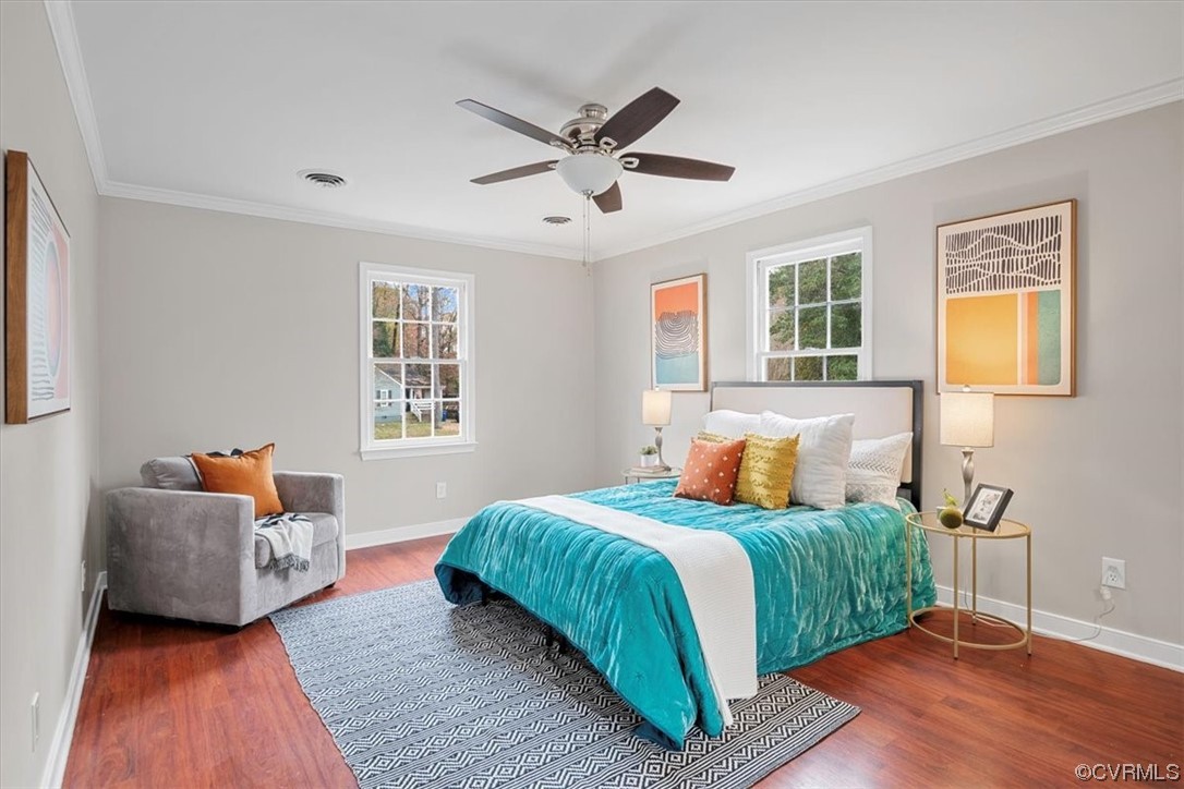 4606 Brookridge Road Chesterfield, VA 23832 - Photo 27 of 48 a bedroom with a bed and wooden floor