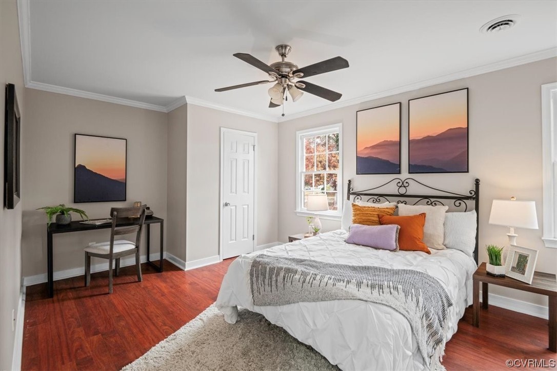 4606 Brookridge Road Chesterfield, VA 23832 - Photo 35 of 48 a bedroom with a bed and wooden floor