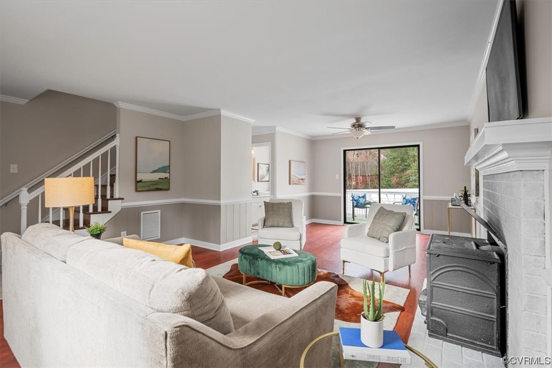 4606 Brookridge Road Chesterfield, VA 23832 - Photo 7 of 48 a living room with furniture and a flat screen tv