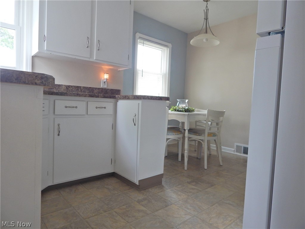 5701 Ackley Road Parma, OH 44129 - Photo 8 of 31 Welcoming Kitchen.