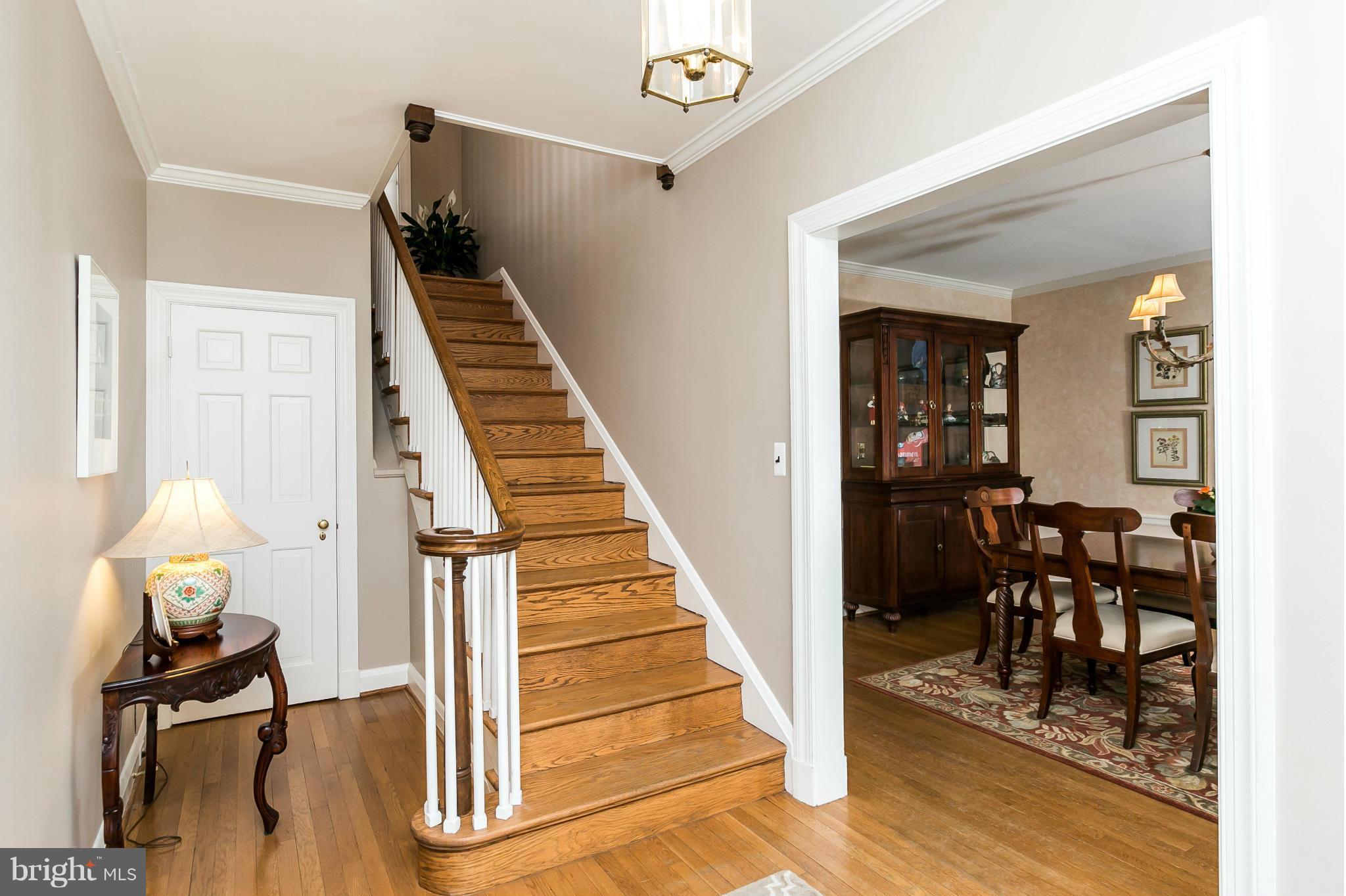 203 Midhurst Road Baltimore, MD 21212 - Photo 2 of 30 a view of entryway and hall with wooden floor